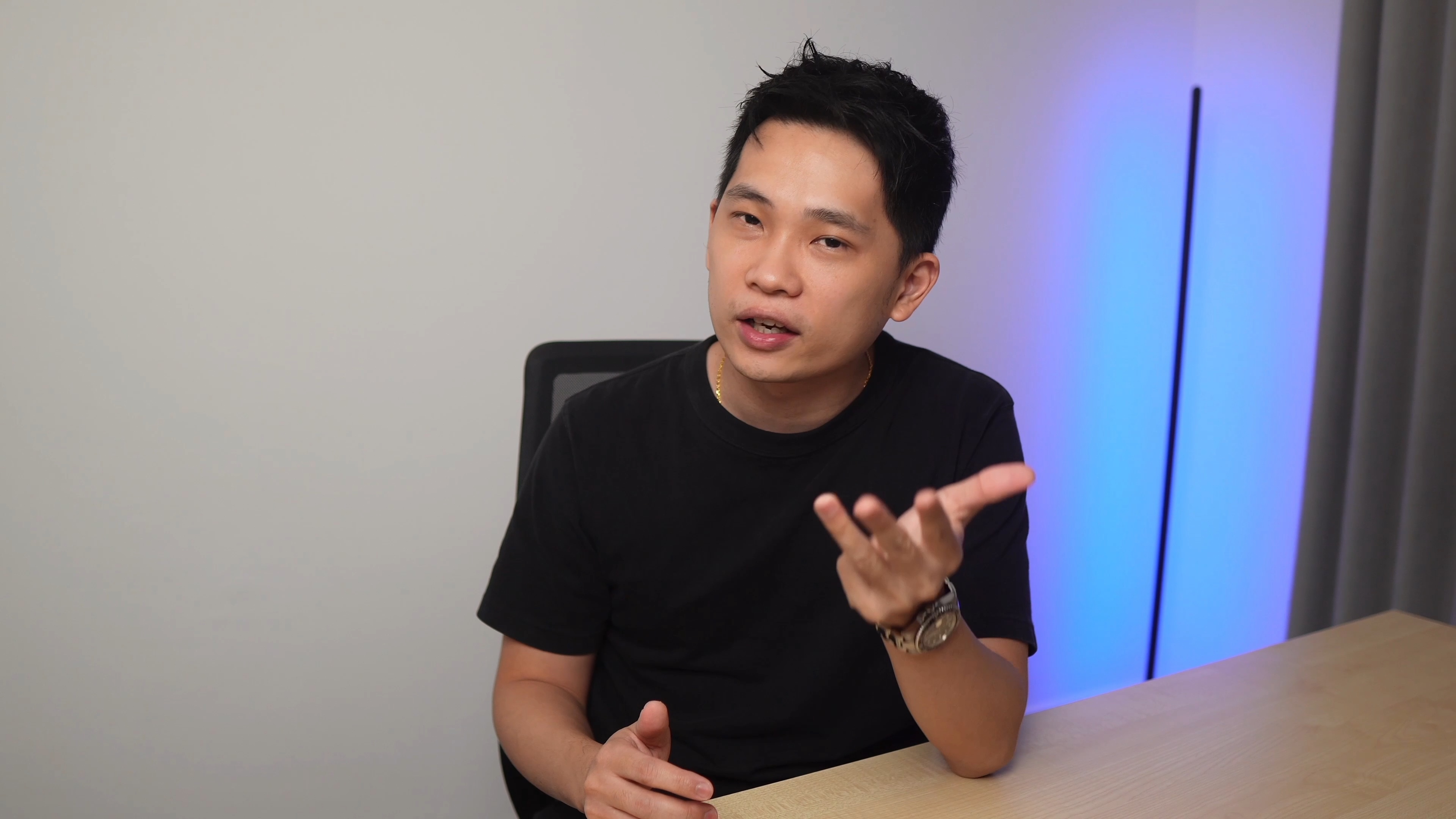 Chenming at the desk in the studio
